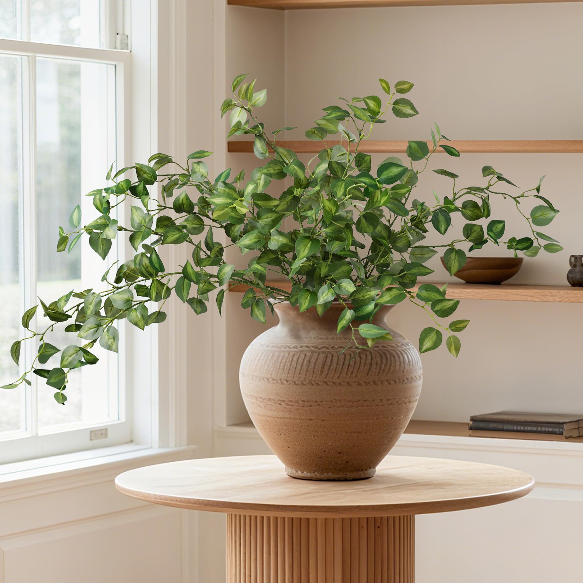 HyeFlora artificial eucalyptus in living room decor boosts cozy ambience.