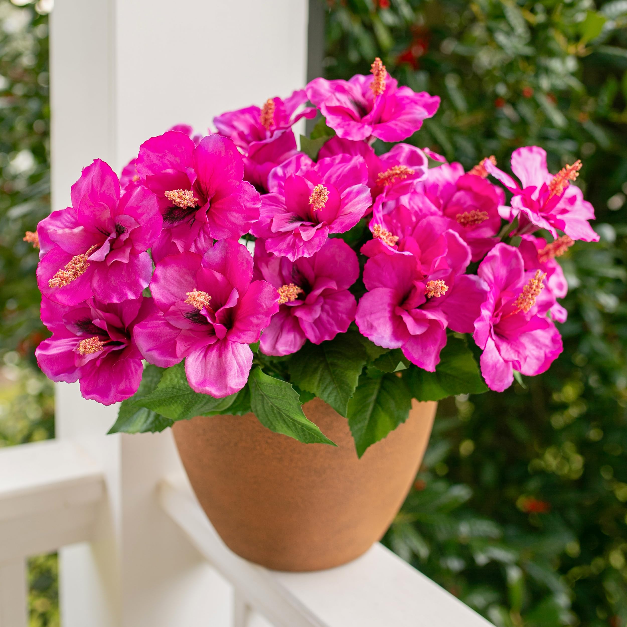 HyeFlora artificial hibiscus bundle appears lifelike from a distance on a patio