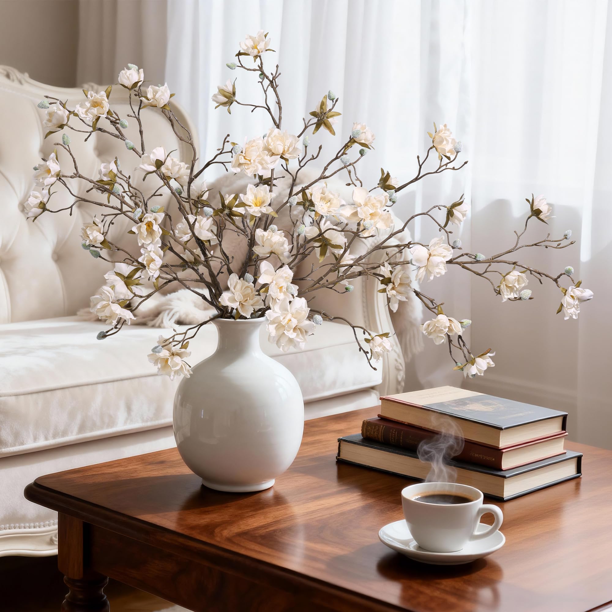 HyeFlora magnolia stem centerpiece creates stylish tablescapes for gatherings.