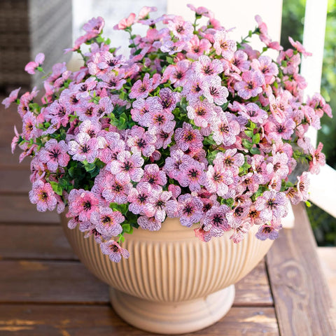 HyeFlora pink daisy with eucalyptus leaves bundle on a cozy living room shelf
