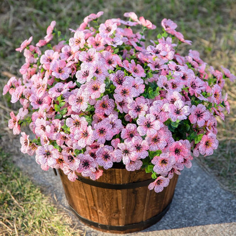 HyeFlora pink daisy with eucalyptus leaves bundle on a patio table