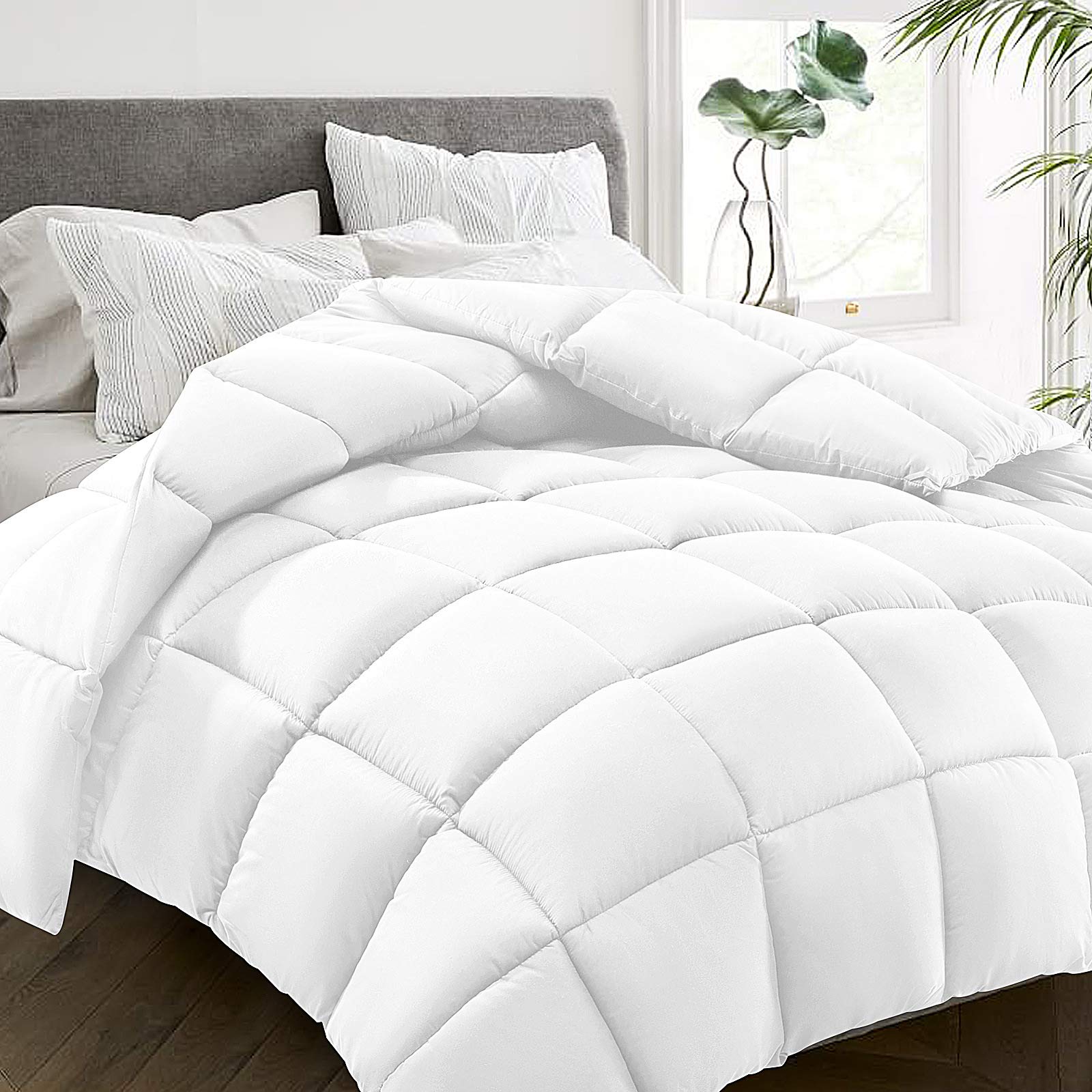 HYLEORY all-season queen comforter surface close-up showing plush peach-skin fabric for cozy sleep