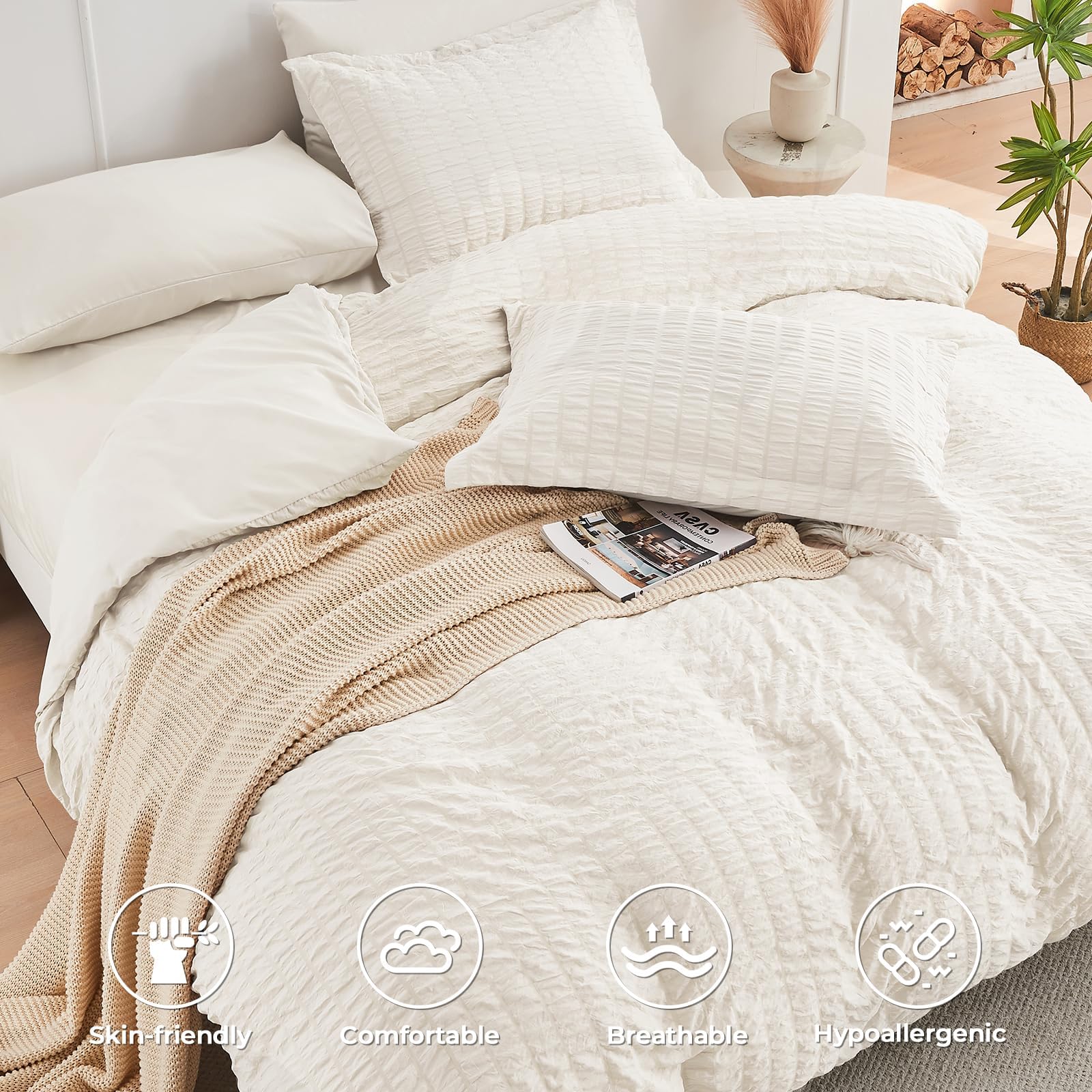 HYMOKEGE Ivory deep-pocket fitted sheet remains secure on 12–15 inch mattresses.