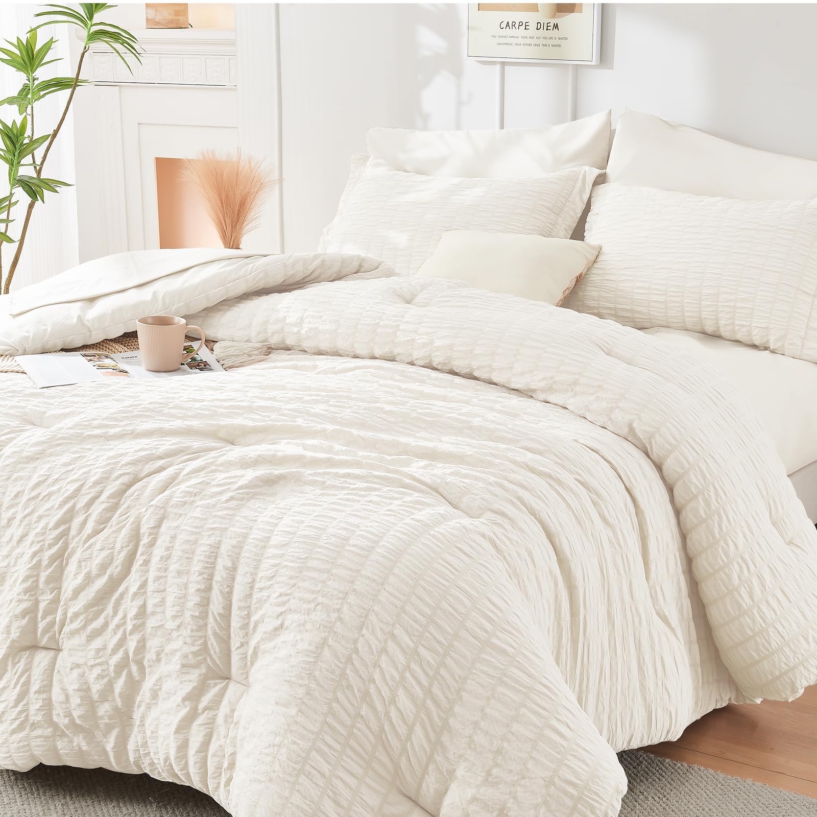 HYMOKEGE Ivory full-size comforter set in seersucker provides all-season warmth.