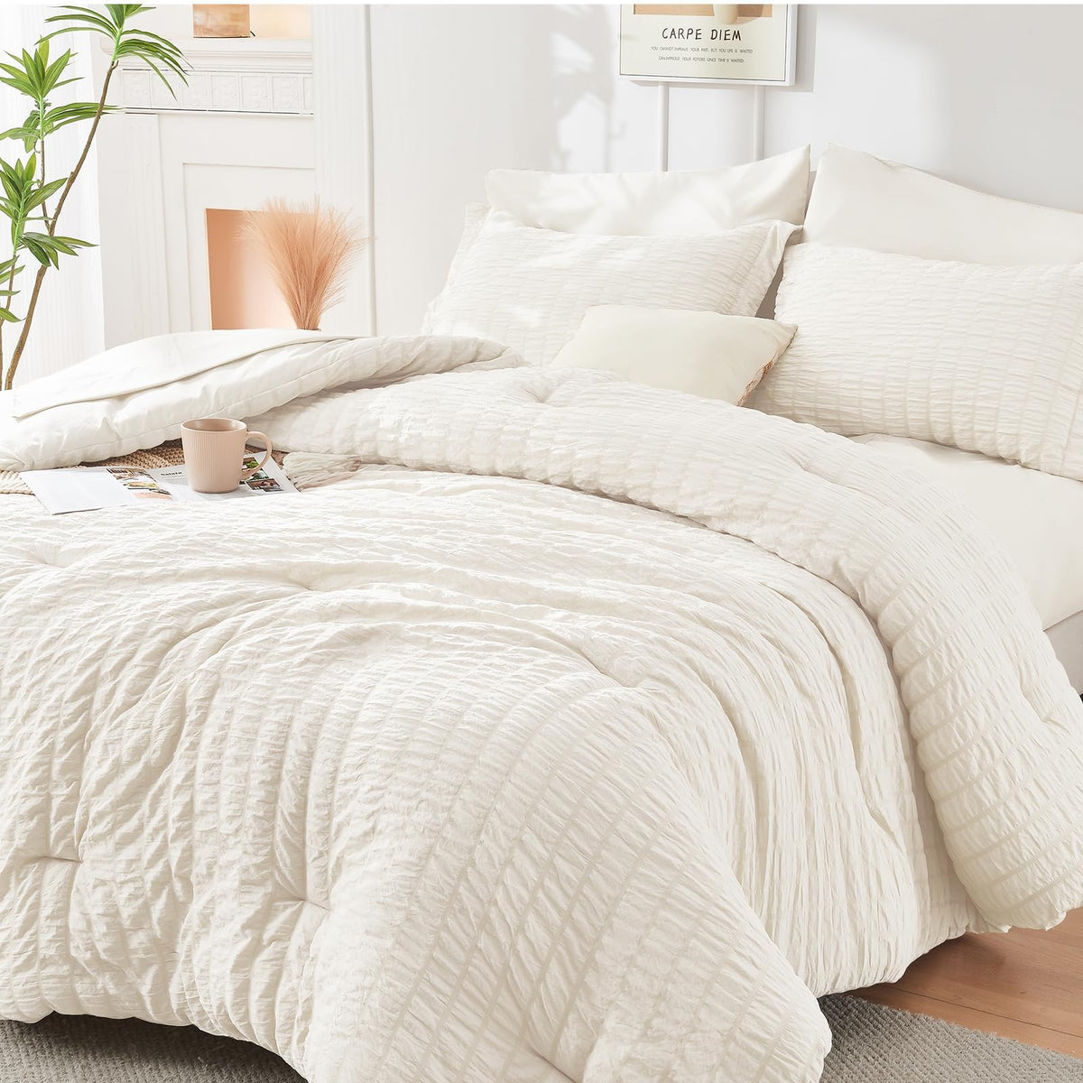 HYMOKEGE Ivory full-size comforter set in seersucker provides all-season warmth.