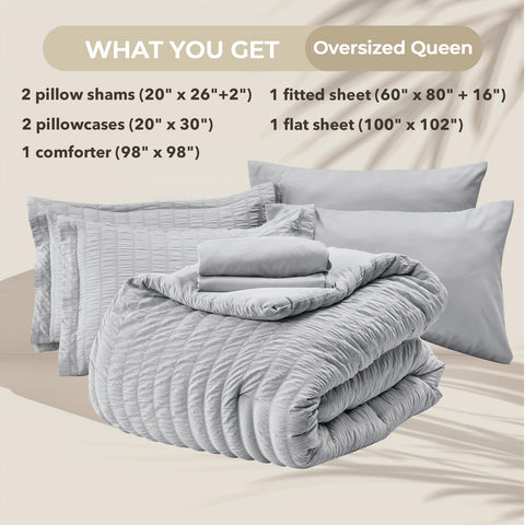 HYMOKEGE shams complement the comforter with matching seersucker detailing