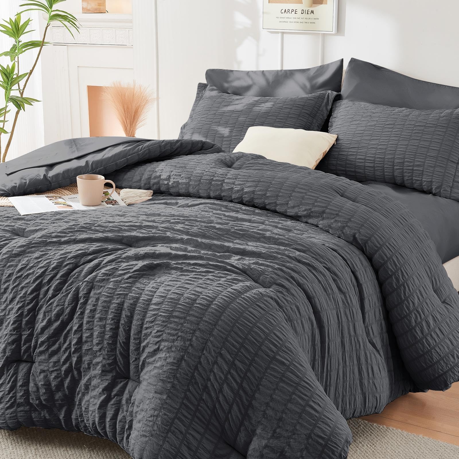 HYMOKEGE oversized king comforter seersucker bundle provides cozy warmth with airy texture.