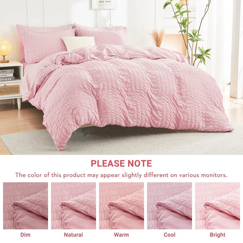 HYMOKEGE Pink Queen comforter close-up highlighting plush feel