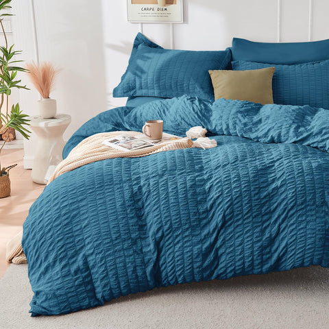 HYMOKEGE Teal packaging in a vacuum bag preserves loft and makes storage easy.