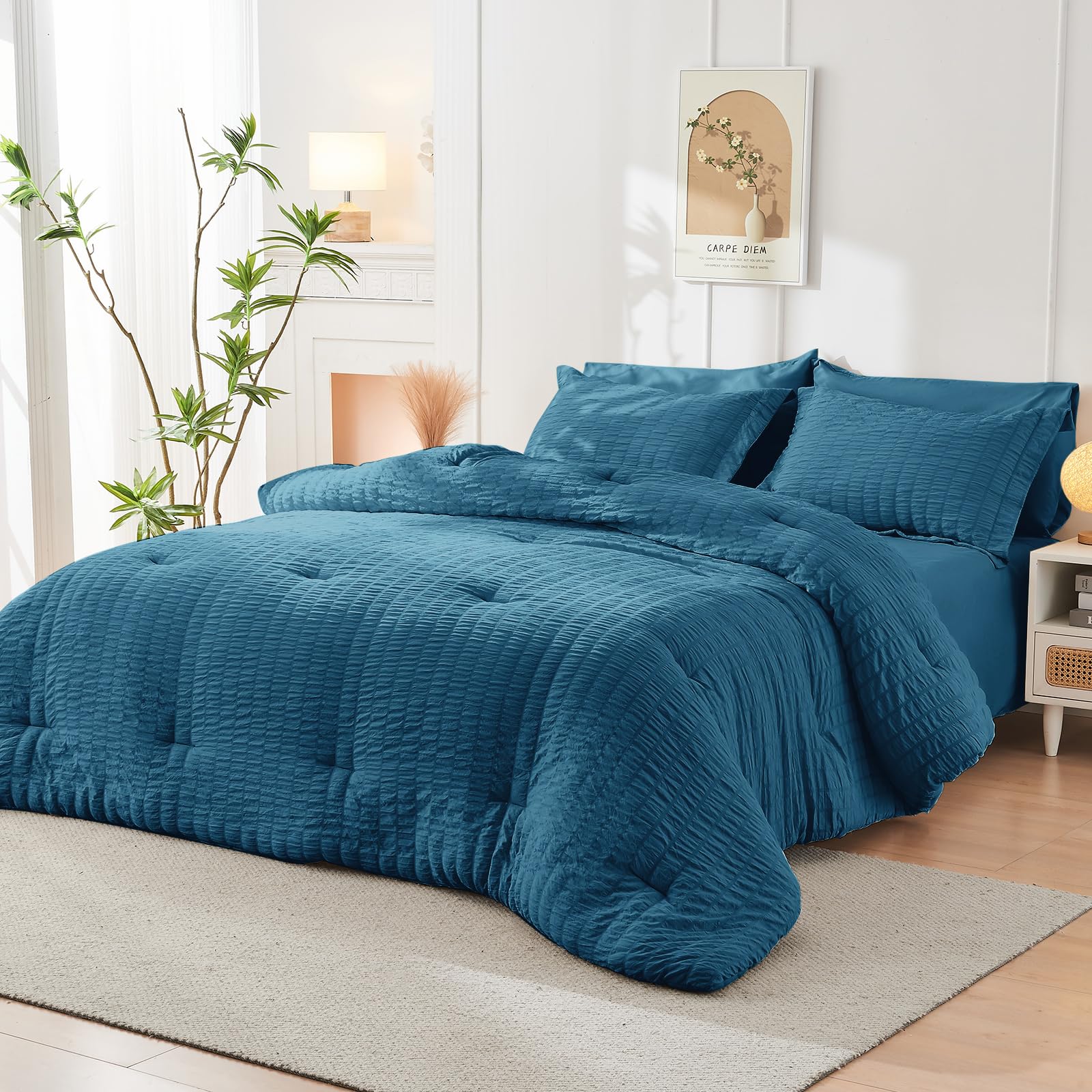HYMOKEGE Teal Queen pillowcases and shams complete the coordinated look.