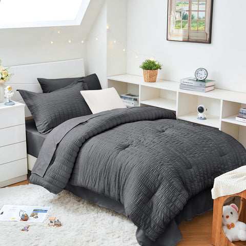 HYMOKEGE Twin XL seersucker comforter set on bed for cozy all-season style