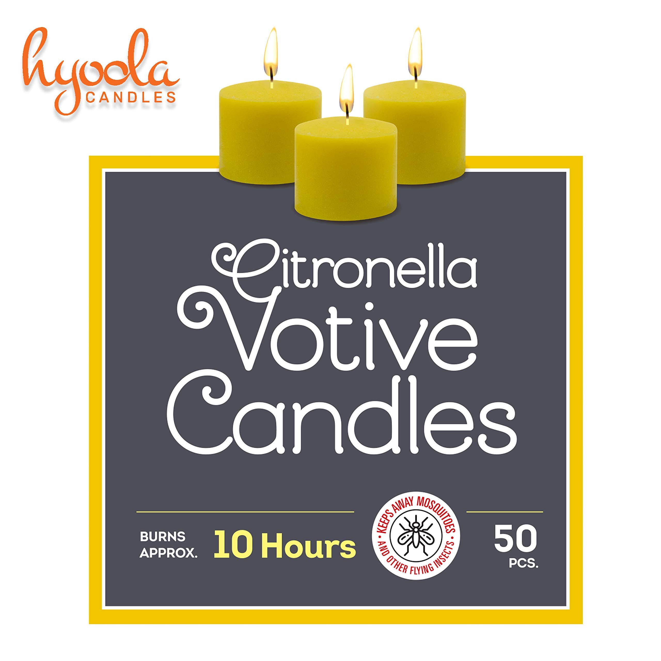 Hyoola citronella votive candles outdoors beside a cup and plant setting