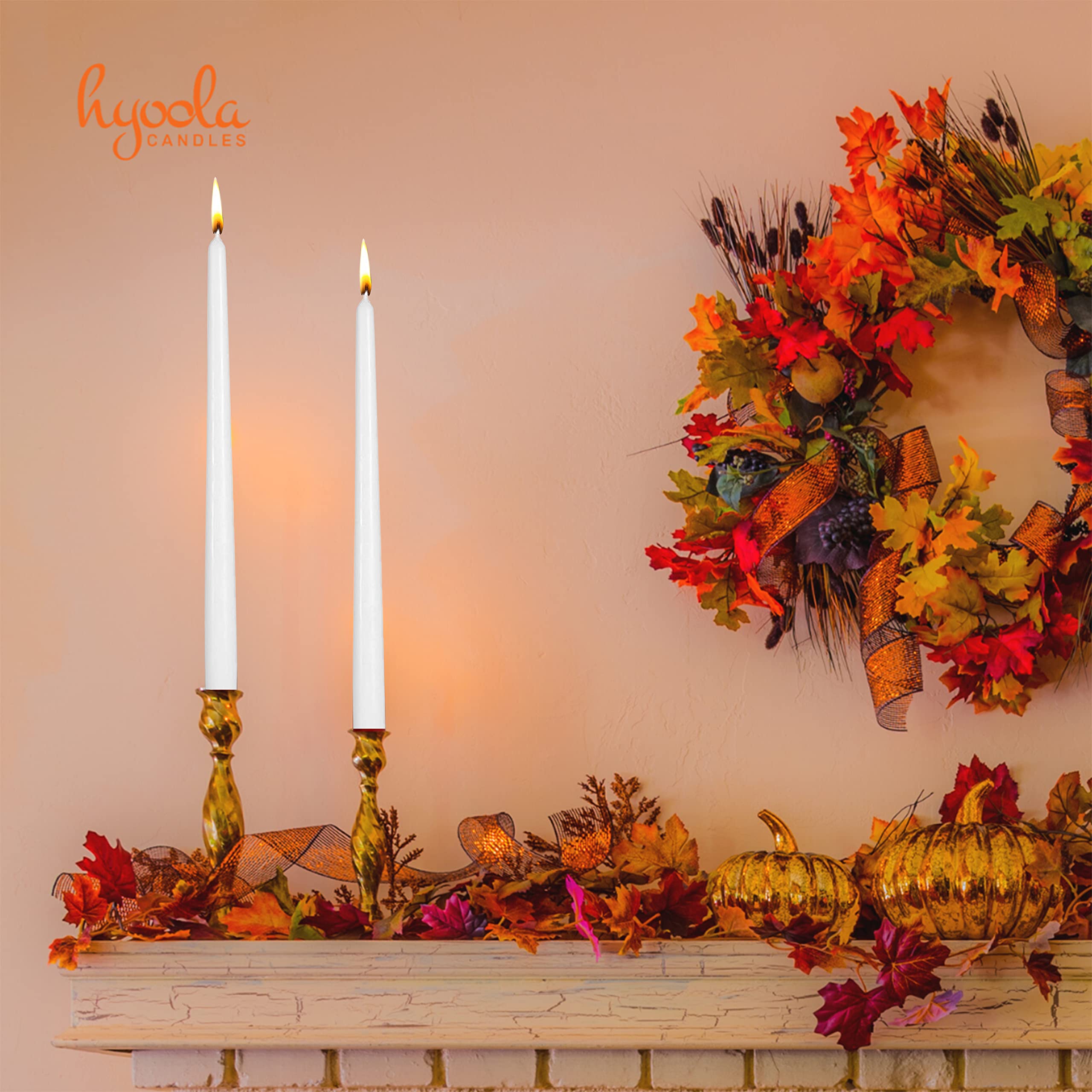 Hyoola white 16 inch candles casting clean ambience on a dining table.