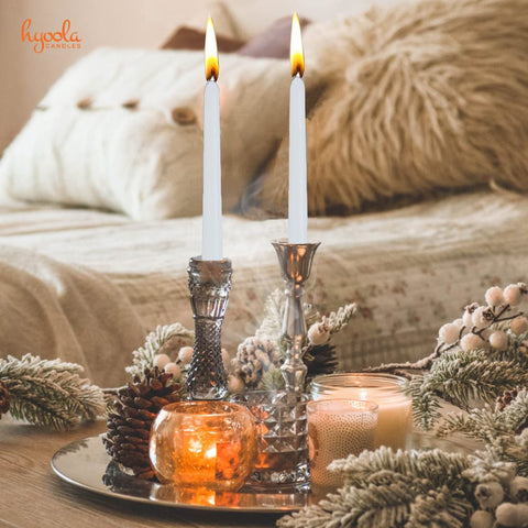 Hyoola taper candles arranged for a wedding reception setting.