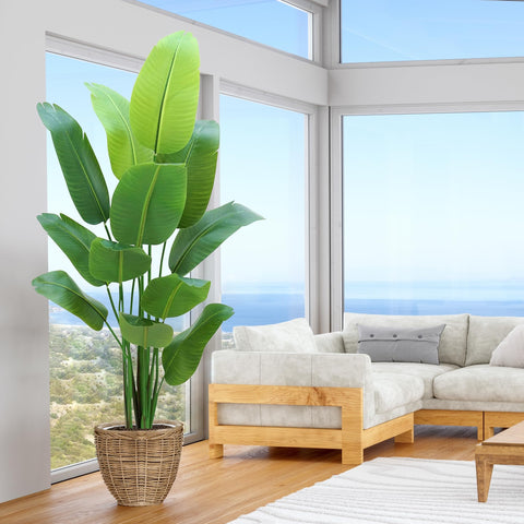 HZXGCP Bird of Paradise 6ft artificial tree enhances living room decor with tropical elegance.
