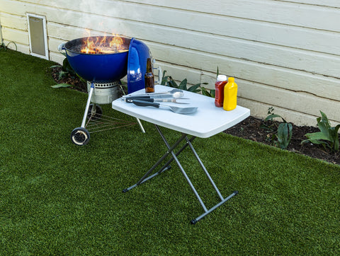 Iceberg folding table multipurpose use as coffee table or laptop desk.