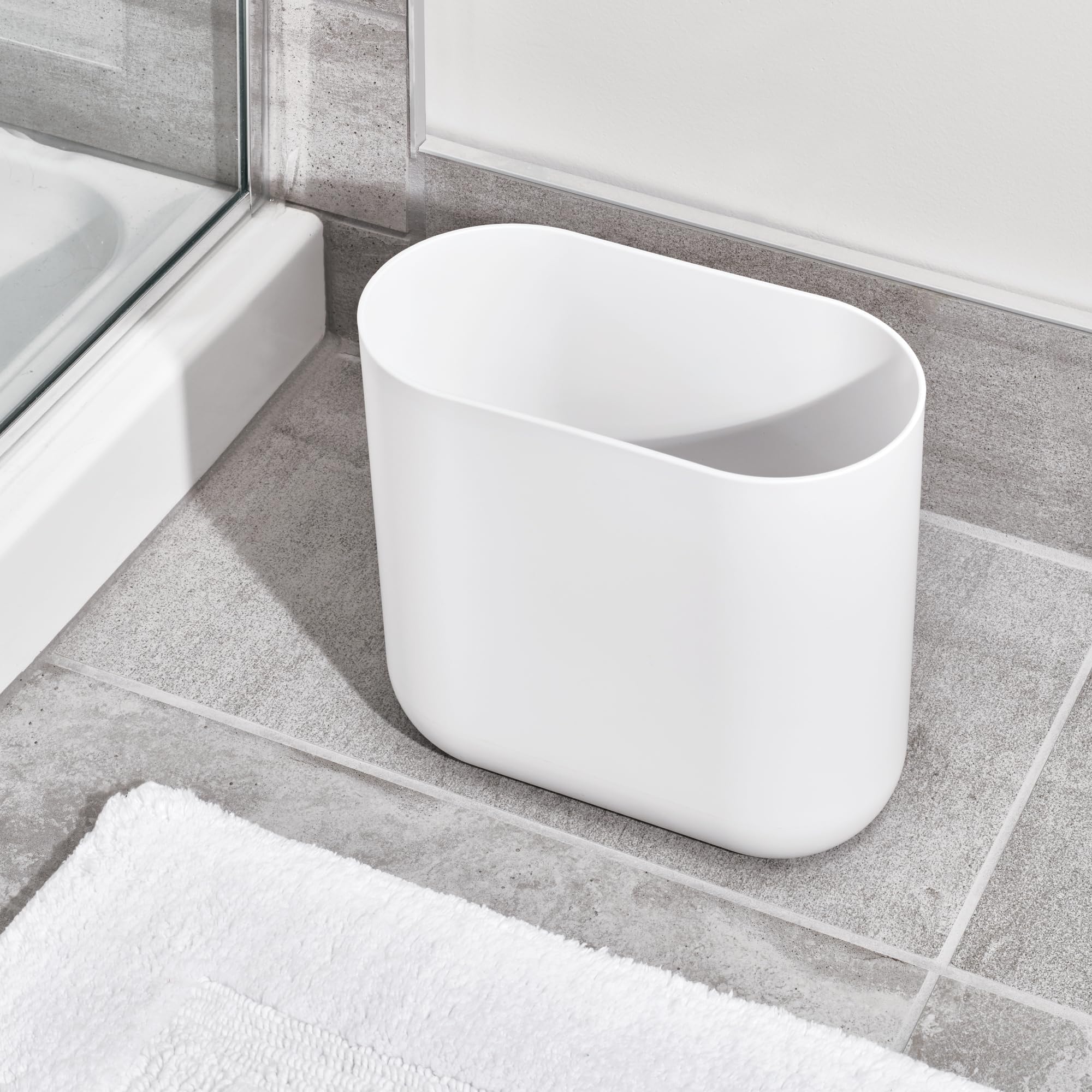 iDesign open-top oval design eases disposal in tight spots