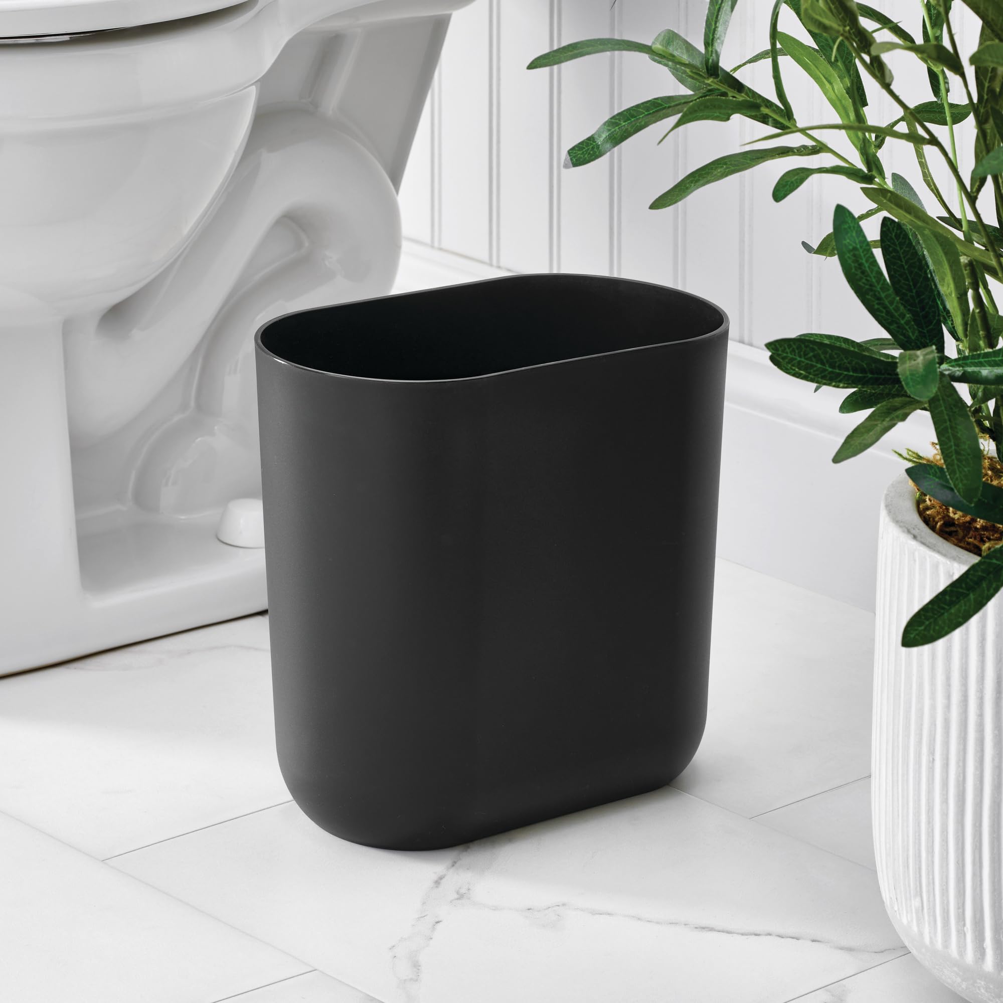 iDesign under-desk trash can supports a tidy work area.