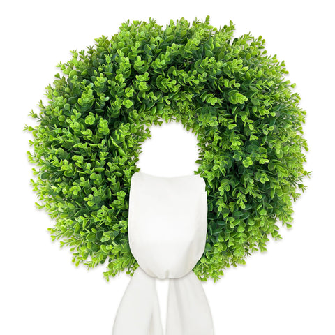 IDOGliitte boxwood wreath with folding base for space-saving entryway decor.