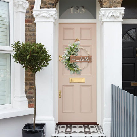 Idyllic 16 inch diameter wreath frames doors and entryways with presence.