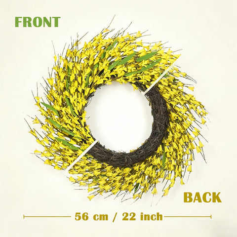 Close-up of lifelike forsythia flowers on Idyllic wreath.