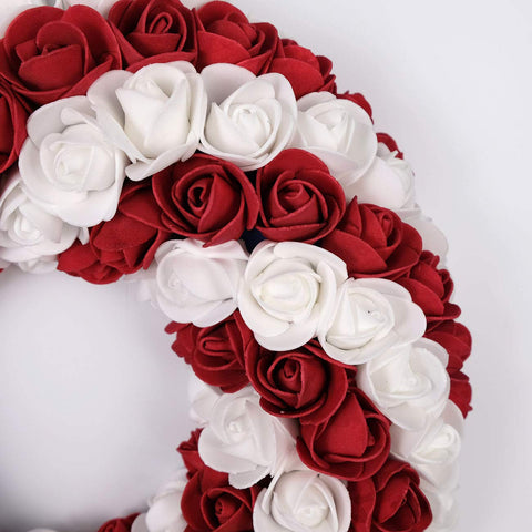 Idyllic handcrafted patriotic wreath adds festive home decor.
