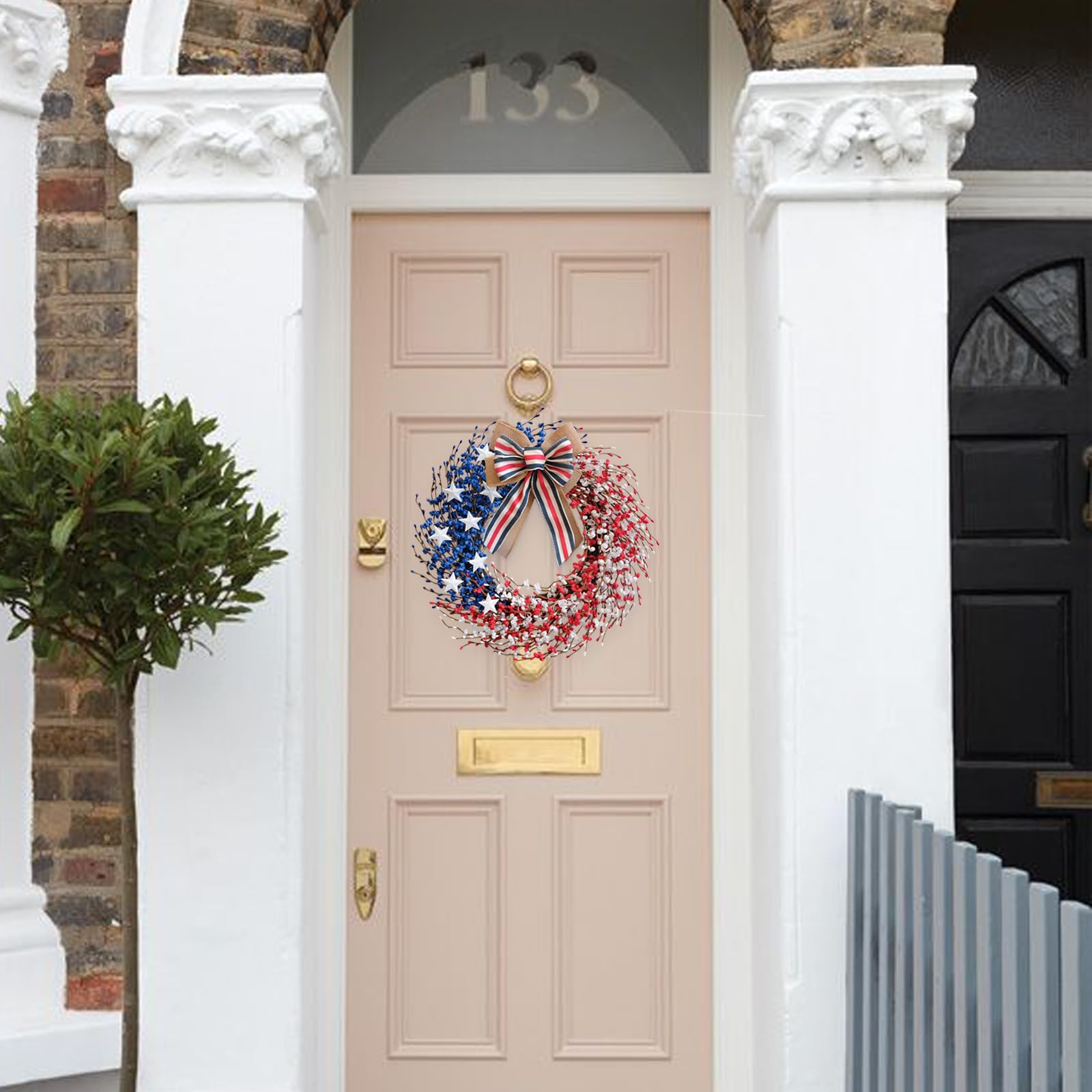 Idyllic porch-windows wreath adds versatile patriotic charm to entryways.