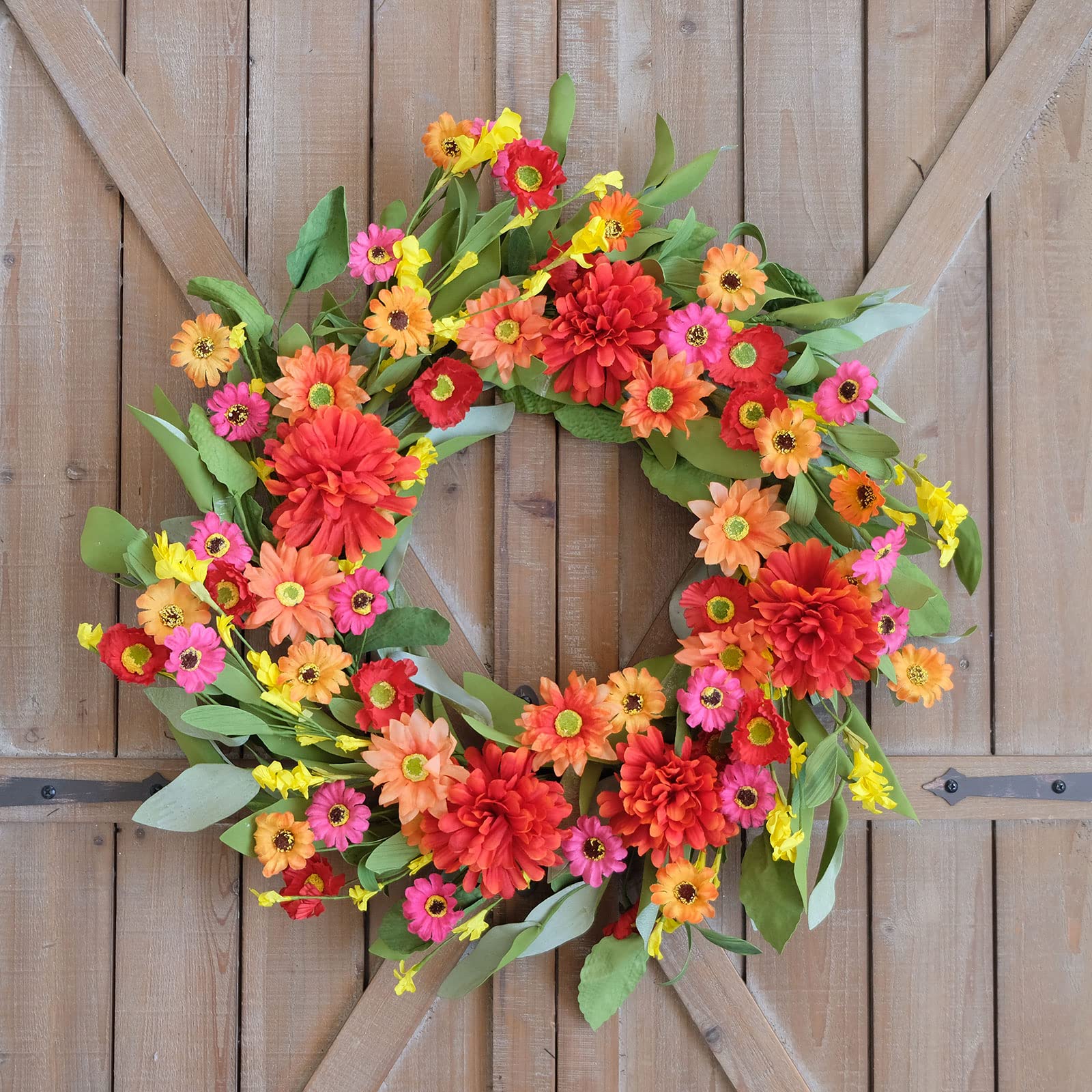 Idyllic 20in wreath features green leaves for year-round decor.