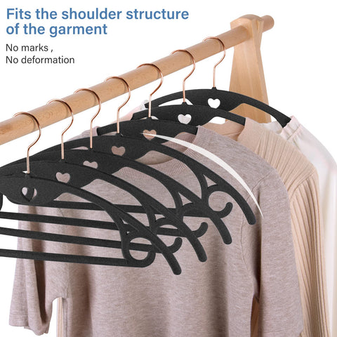 IEOKE Velvet Hangers ten point five pound capacity supports jackets securely.
