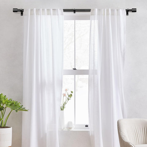 IFELS curtain rod end caps in matte black add modern detail