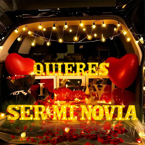 IFNCPF LED letters on table create a warm glow for romantic proposal decor.
