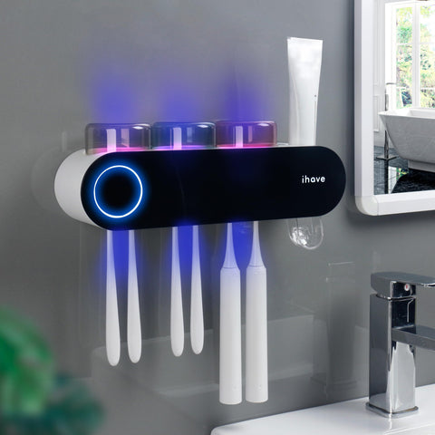IHAVE wall-mounted toothbrush holder with 3 cups keeps family brushes organized and accessible.