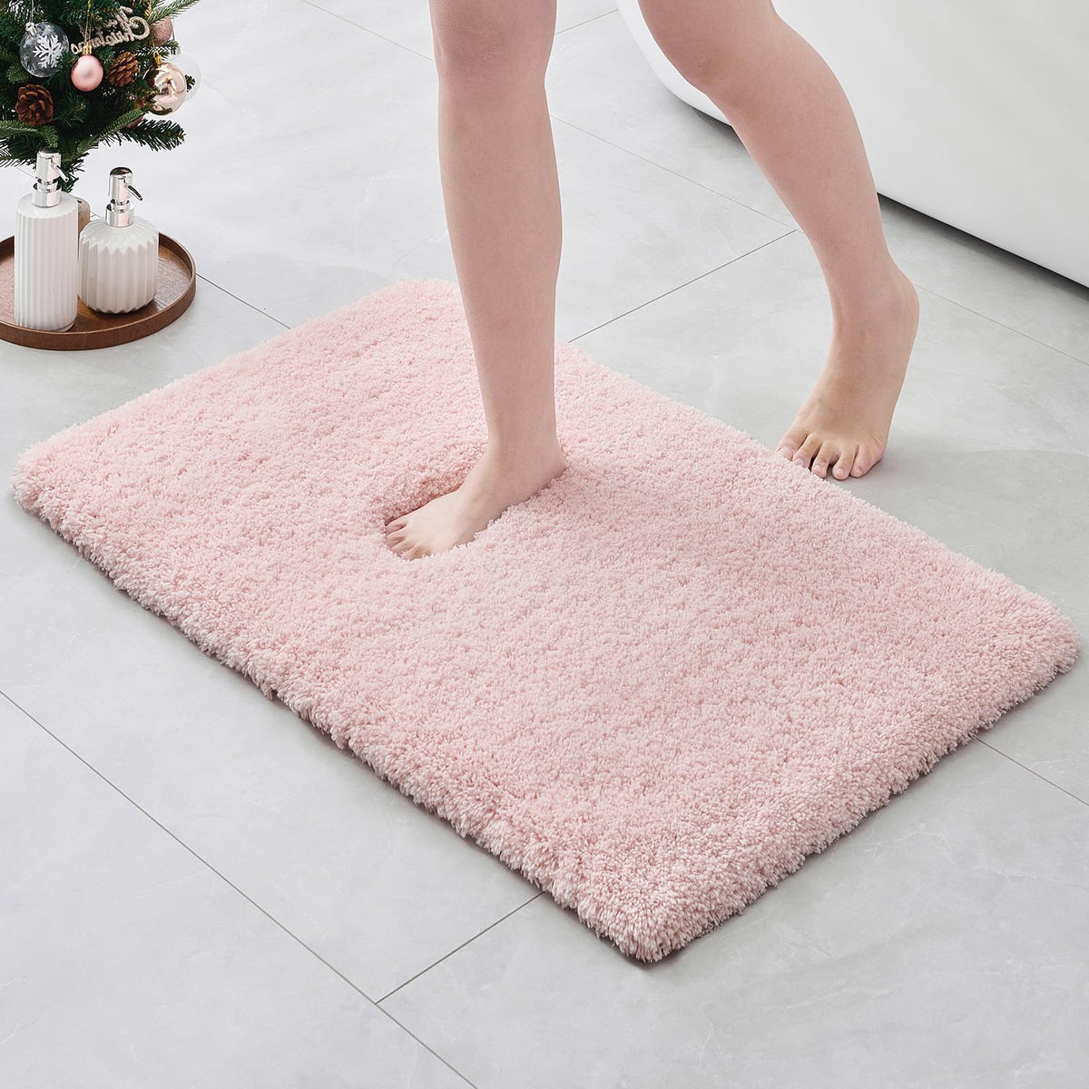 ILANGO pink Christmas bath rug front view shows plush comfort and full bathroom coverage