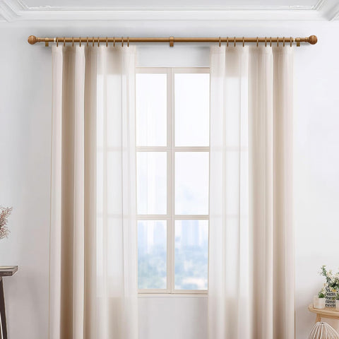 Immiehh wood curtain rod showcases grain finish and sturdy support for heavier drapes.