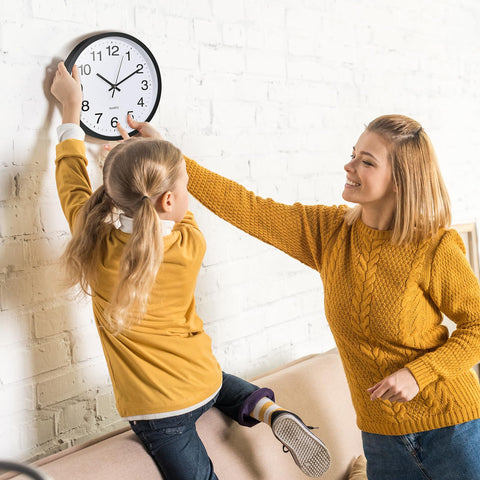 Inbagi wall clock hanging hook demonstrates quick wall mounting