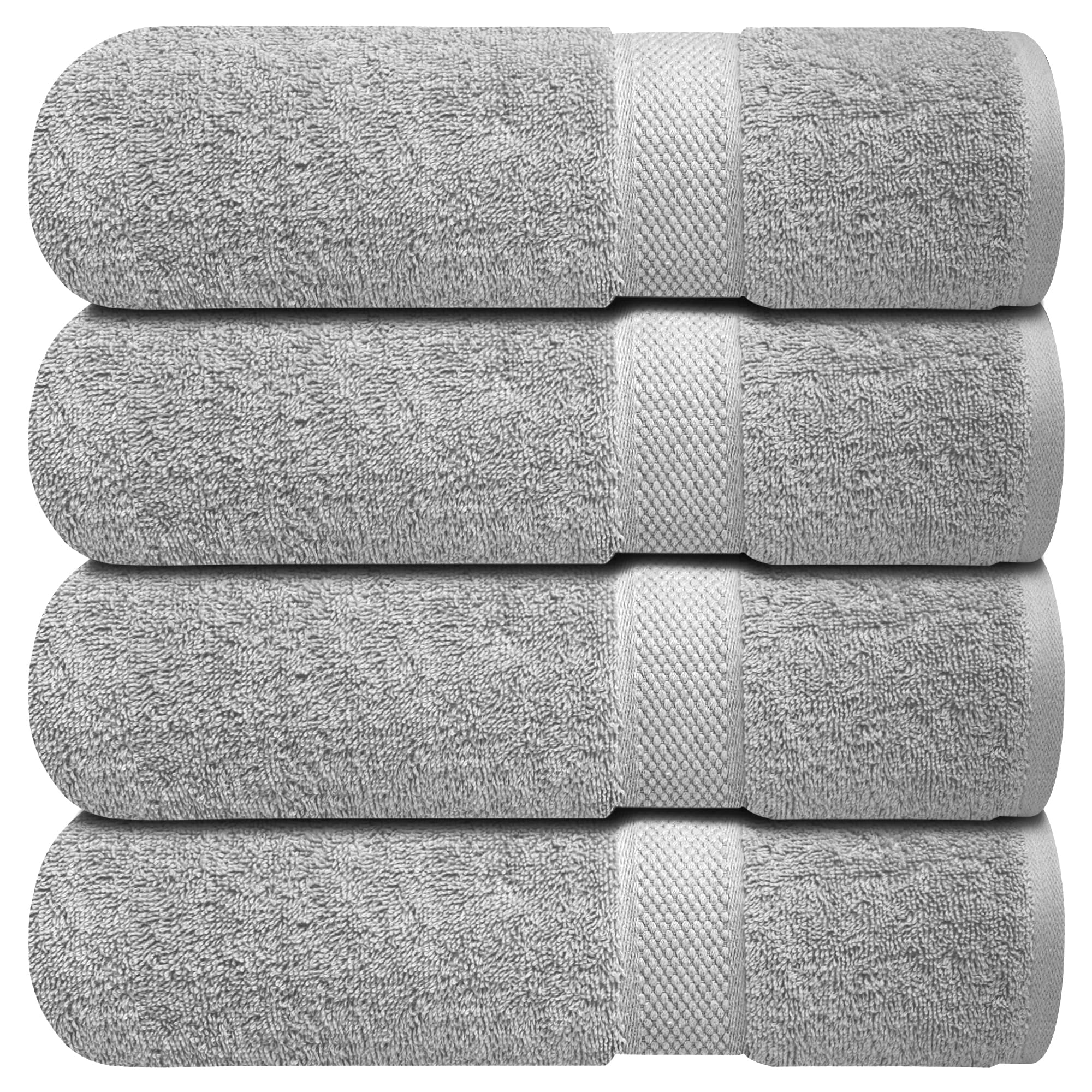 Infinitee Xclusives bath towels four-piece collection in a luxurious bathroom