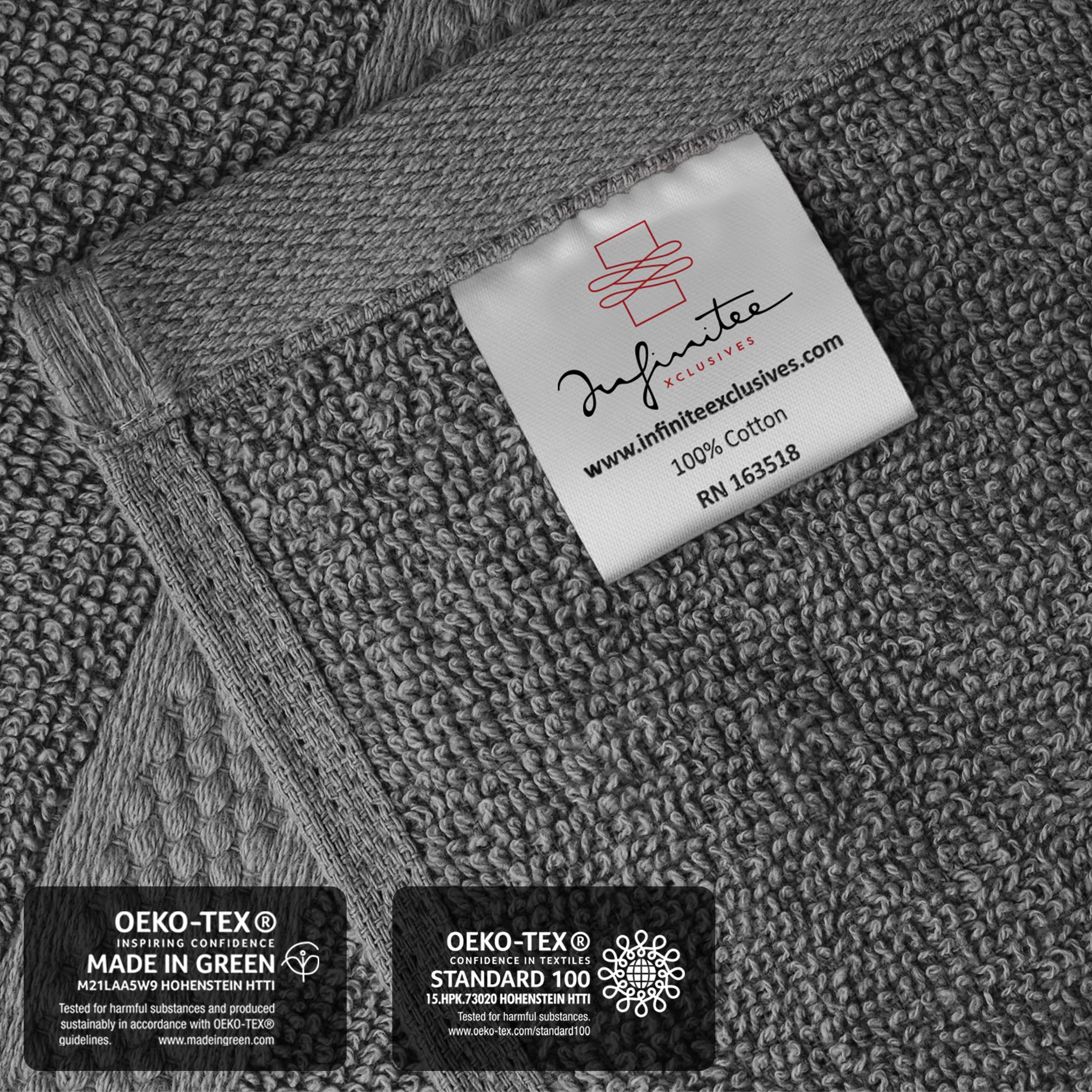 Infinitee Xclusives hotel-quality towels with timeless gray tone in a bathroom