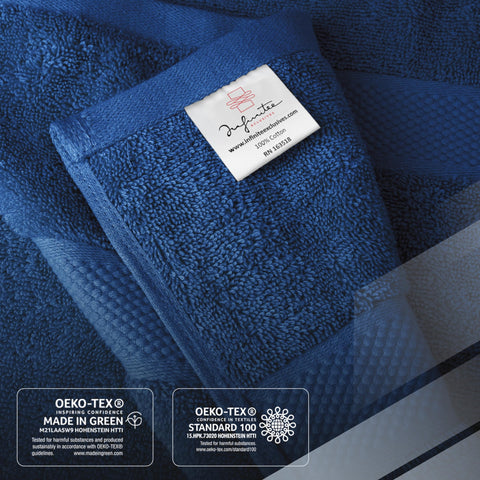 Infinitee Xclusives luxury 100% cotton towel set folded display in a spa-like bathroom