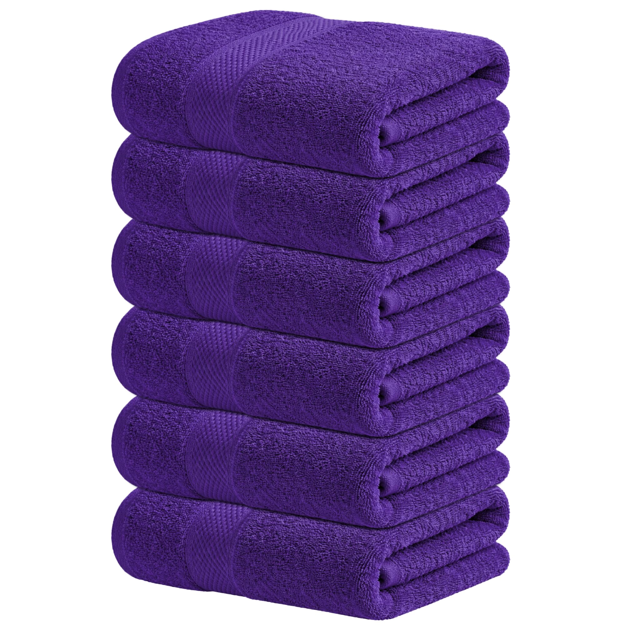 Infinitee Xclusives Purple Hand Towels folded on a shelf show plush softness