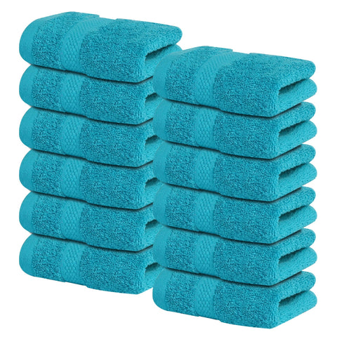 Infinitee Xclusives Serene Teal washcloth set shown for daily shower use with soft plush fibers.