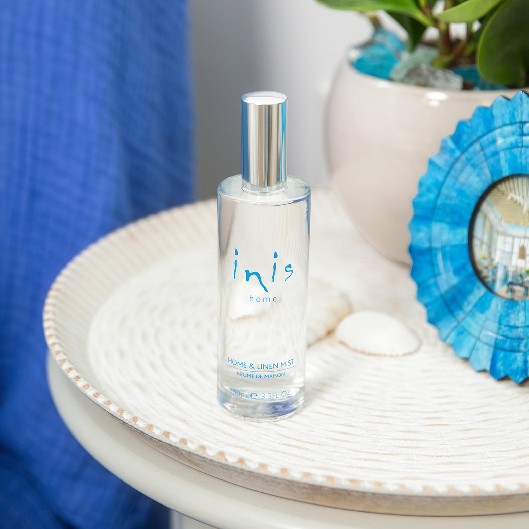 Inis Energy of the Sea home linen mist being sprayed into the air