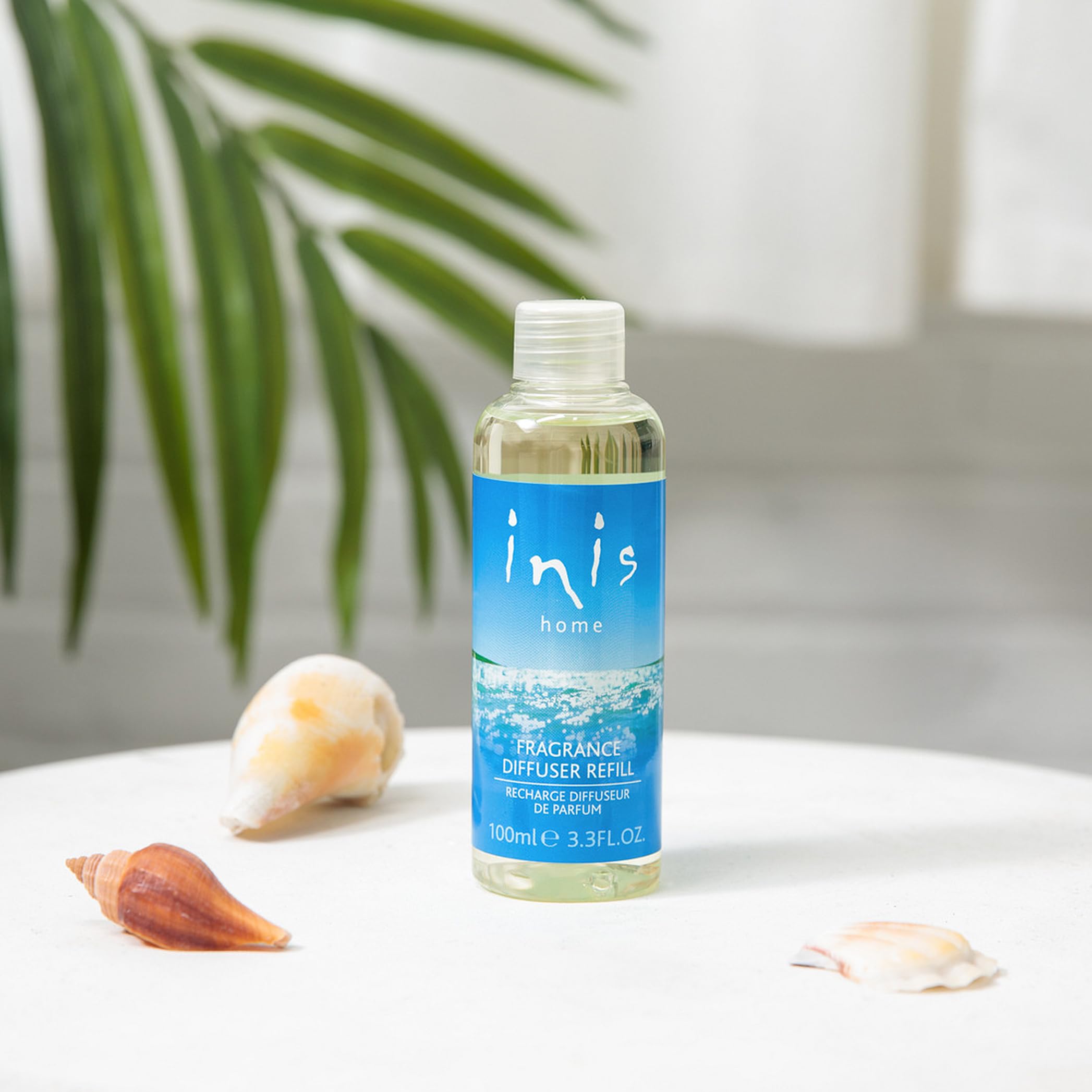 Inis diffuser refill bottle on shelf ready to refresh ambiance