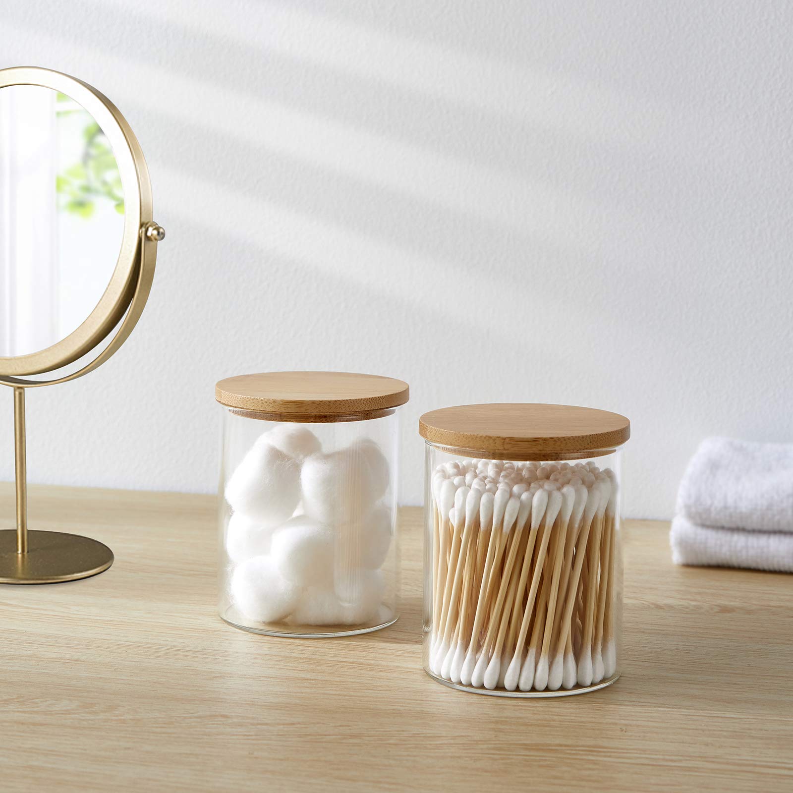 INIUNIK bamboo lids closeup on glass jar for premium storage.