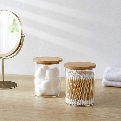 INIUNIK bamboo lids closeup on glass jar for premium storage.