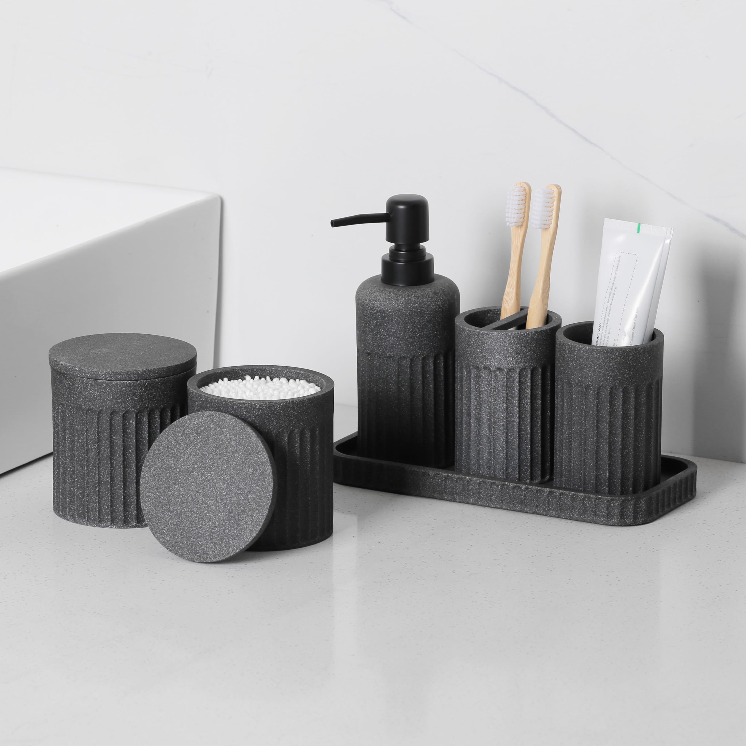 INIUNIK soap dispenser close-up demonstrates smooth pour and premium resin feel.