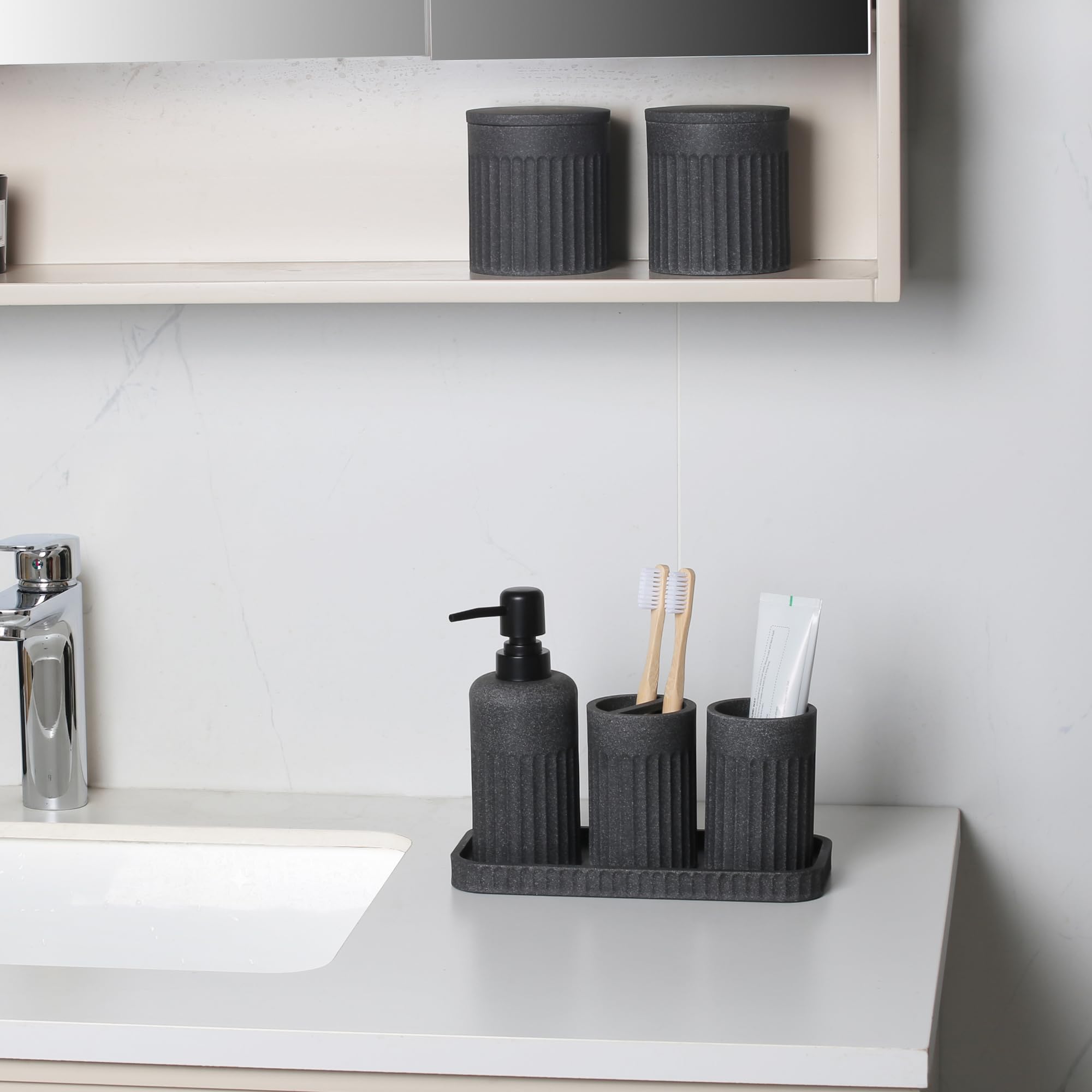 INIUNIK toothbrush holders highlight sturdy resin construction that resists tipping.
