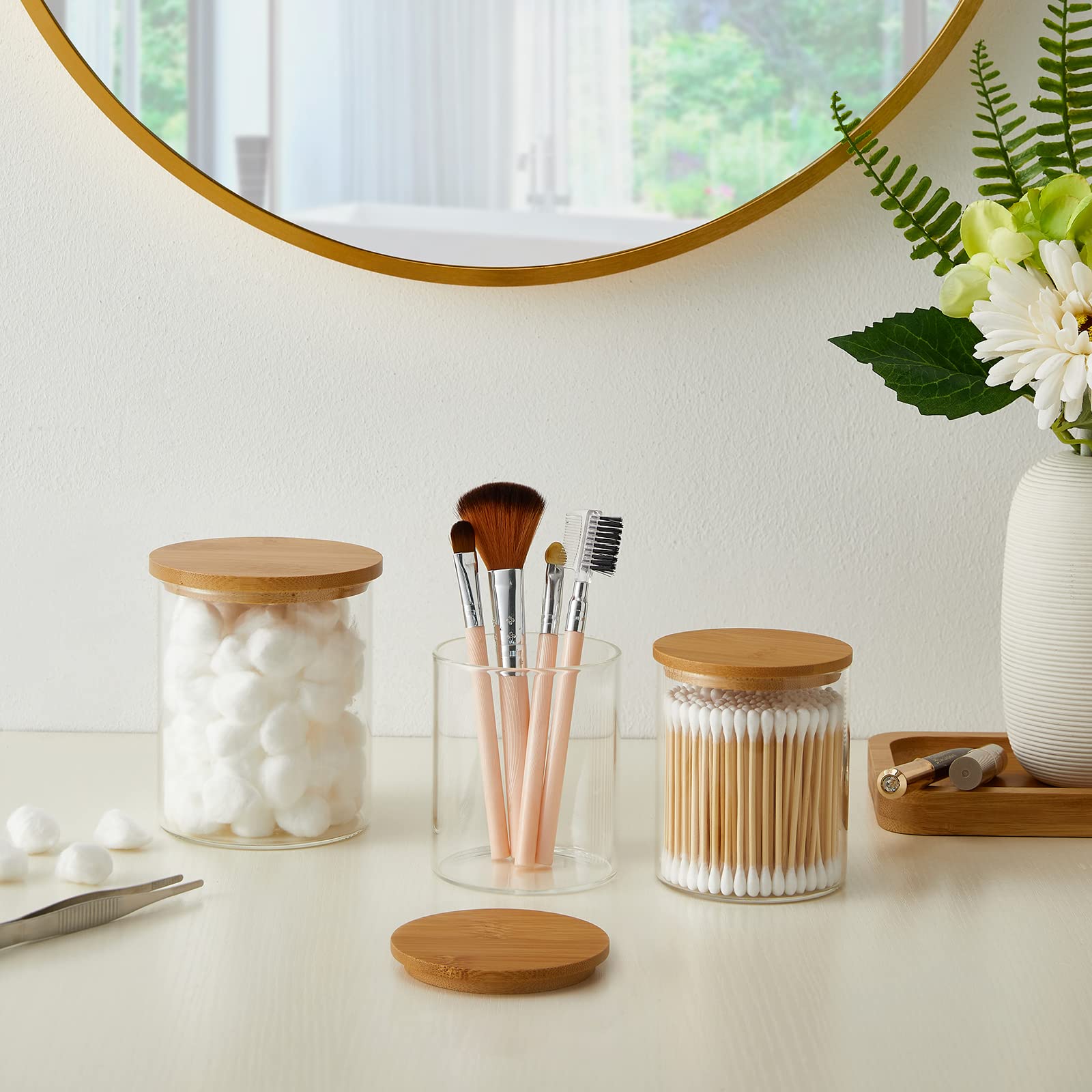 INIUNIK cotton swab jar size highlights compact bathroom storage.
