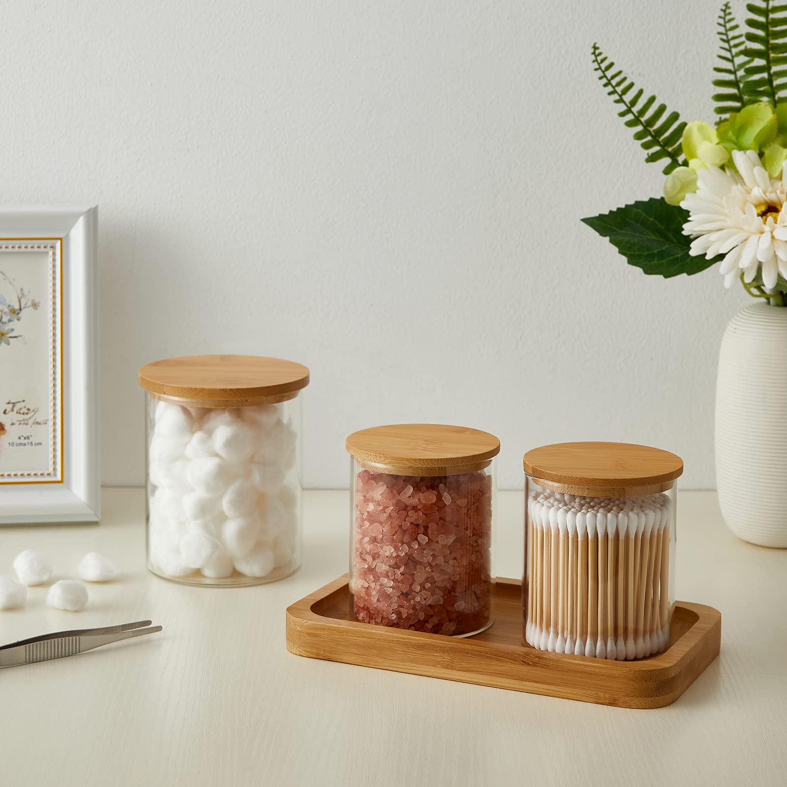 INIUNIK multi-use bathroom organizer holds q-tips, pads, and small items.