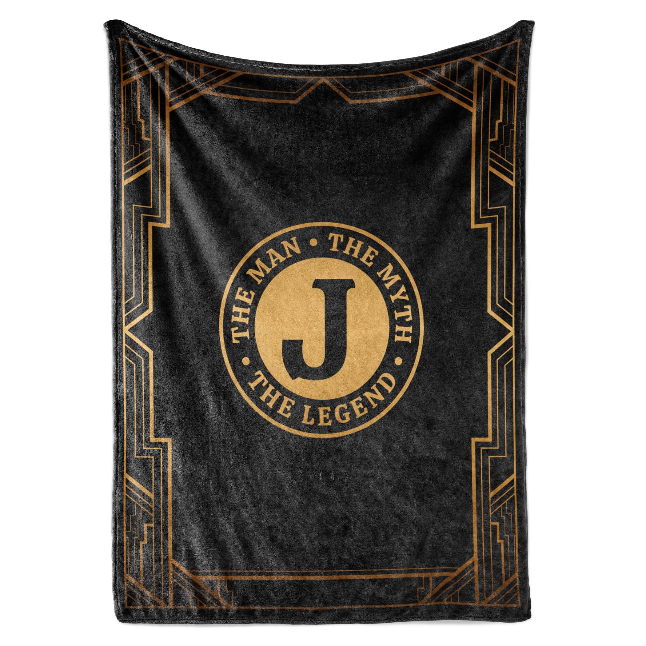 InnoBeta Legend Initial Plush Throw on sofa, cozy evenings and warm comfort.