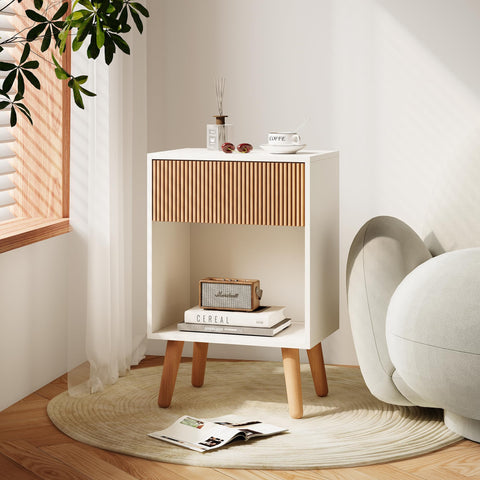 INNOD Fluted Nightstand in a bedroom setup with warm, minimalist charm